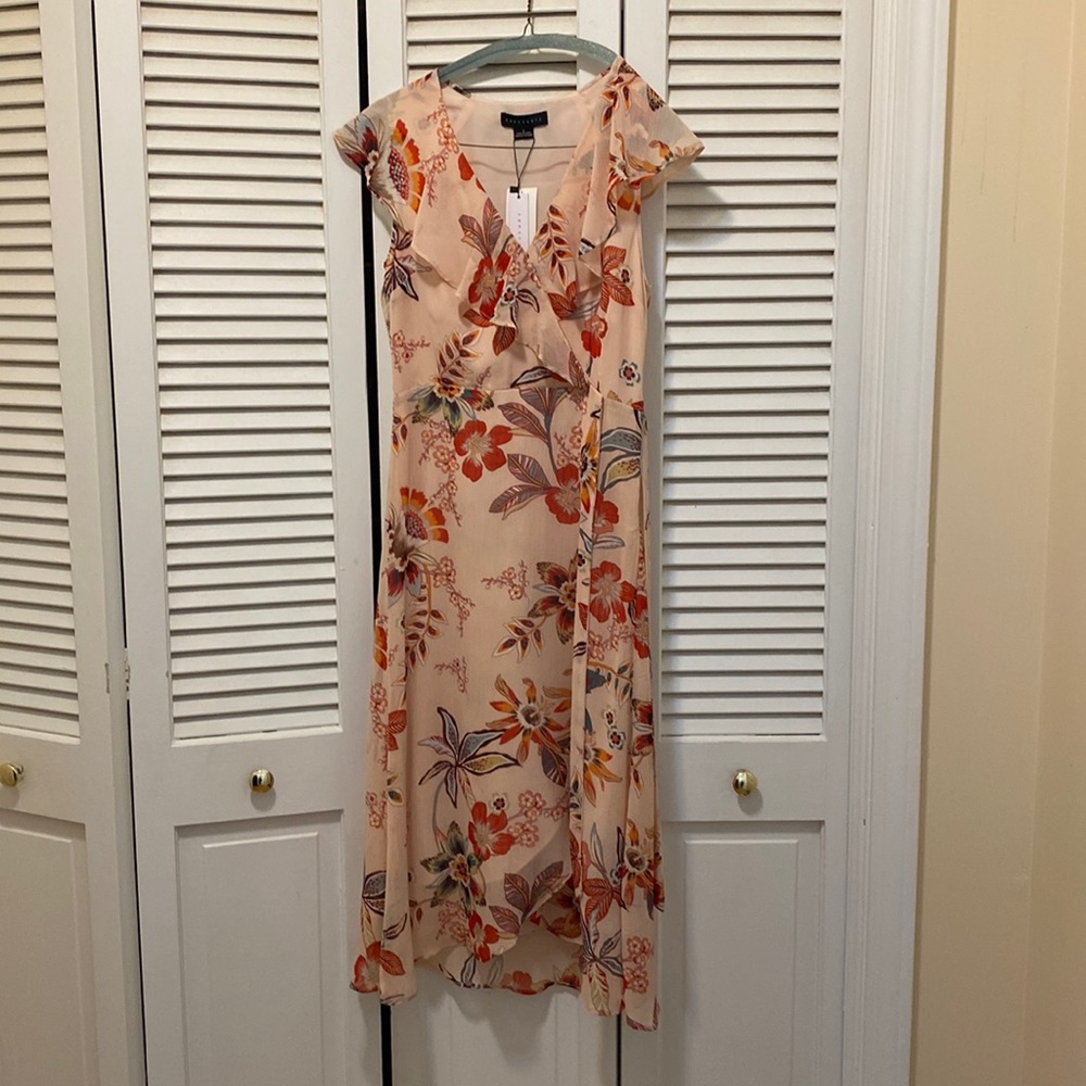 NWT sz 2 Sanctuary beautiful peach floral dress. Faux wrap front, midi length.
